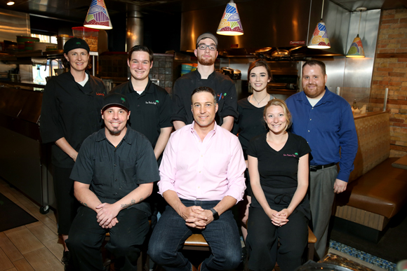 Pete Foster, front row center, with some of his staff at San Pedro Cafe.