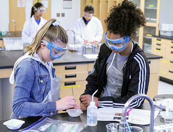 Students work on their entries in the Wisconsin Science Olympiad competition March 16 at UW-Stout.