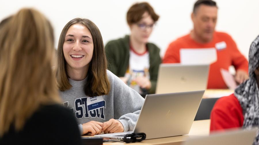 Students, including Summer Schaefer, second from left, take part in the summer registration and orientation for fall classes, which began Sept. 7.