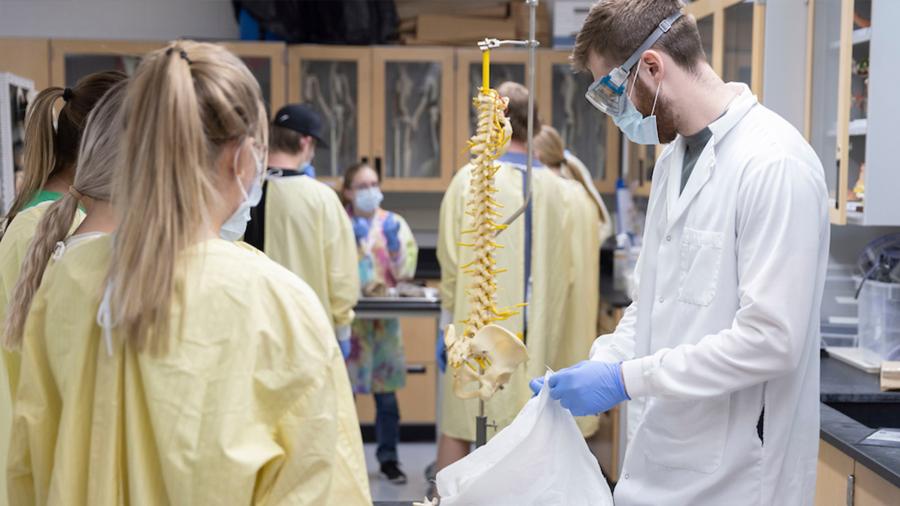 Ethan Kalin with students in the Cadaver Lab