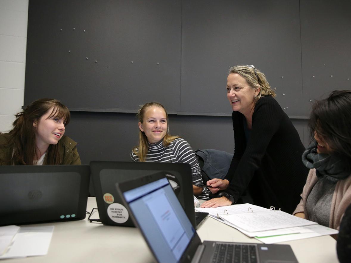 UW-Stout Professor Maureen Mitton, director of the Interior design Bachelor of Fine Arts program, talks with students during a recent interior design class. Mitton has been named a Most Admired Educator by Design Intelligence./ UW-Stout photo by Brett T. Roseman