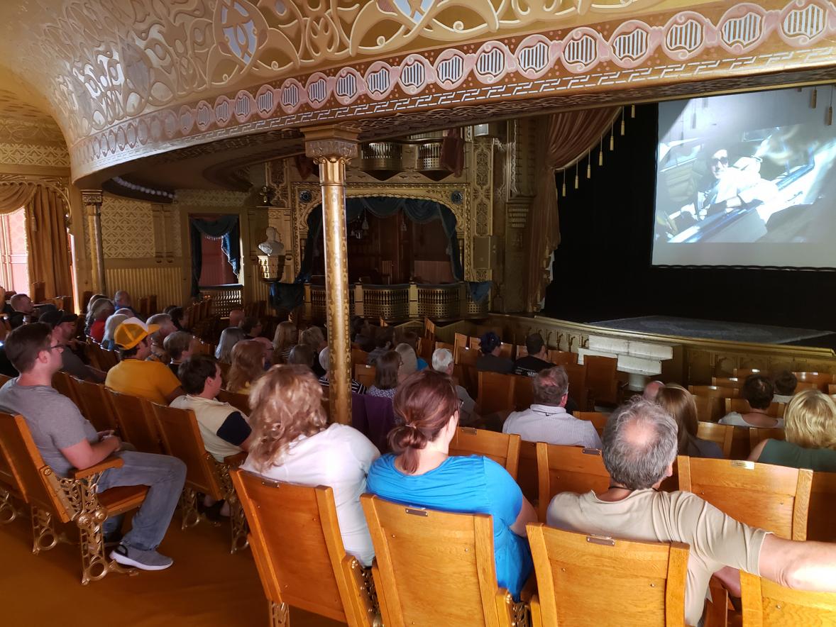 Red Cedar Film Festival attendees watch a festival film at the Mabel Tainter Center for the Arts in Menomonie.