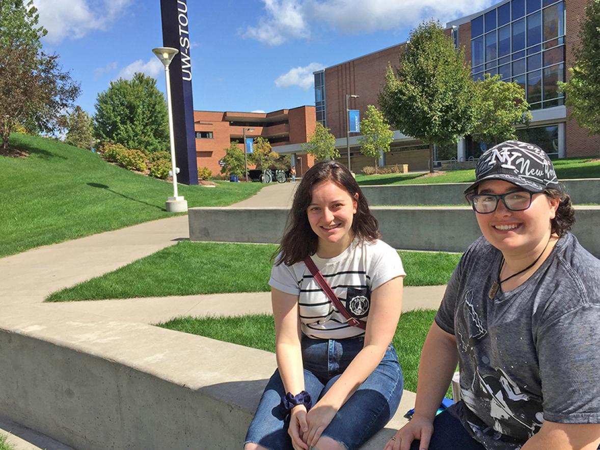UW-Stout junior mentor Ciara Leonhardt, at left, meets with her first-year mentee Juliann Wick for the first time outside the Memorial Student Center.