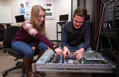 Students working in the CNIT Server Lab on campus.
