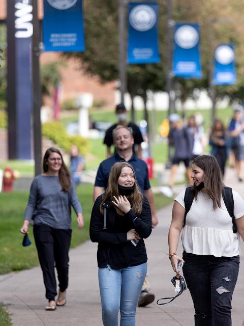 Students walk between classes with the fall semester underway at UW-Stout.